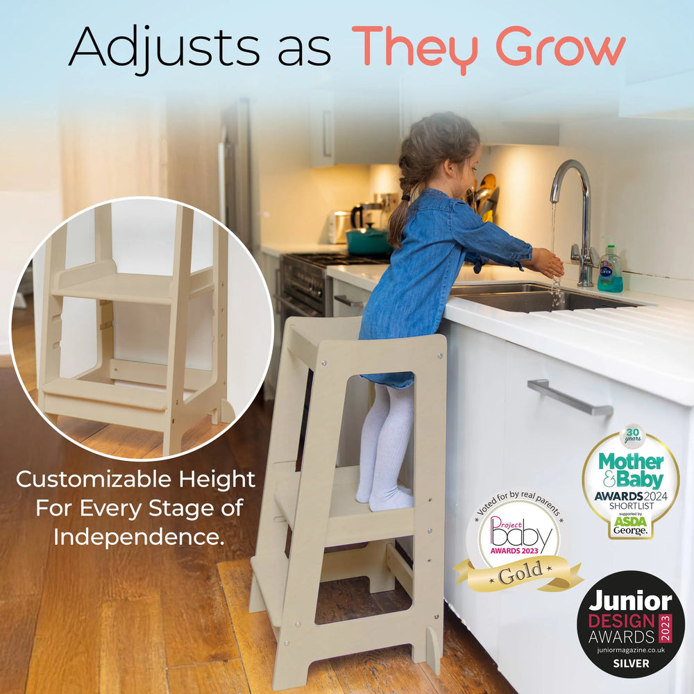 adjustable toddler tower  positioned at kitchen sink for easy reach with awards